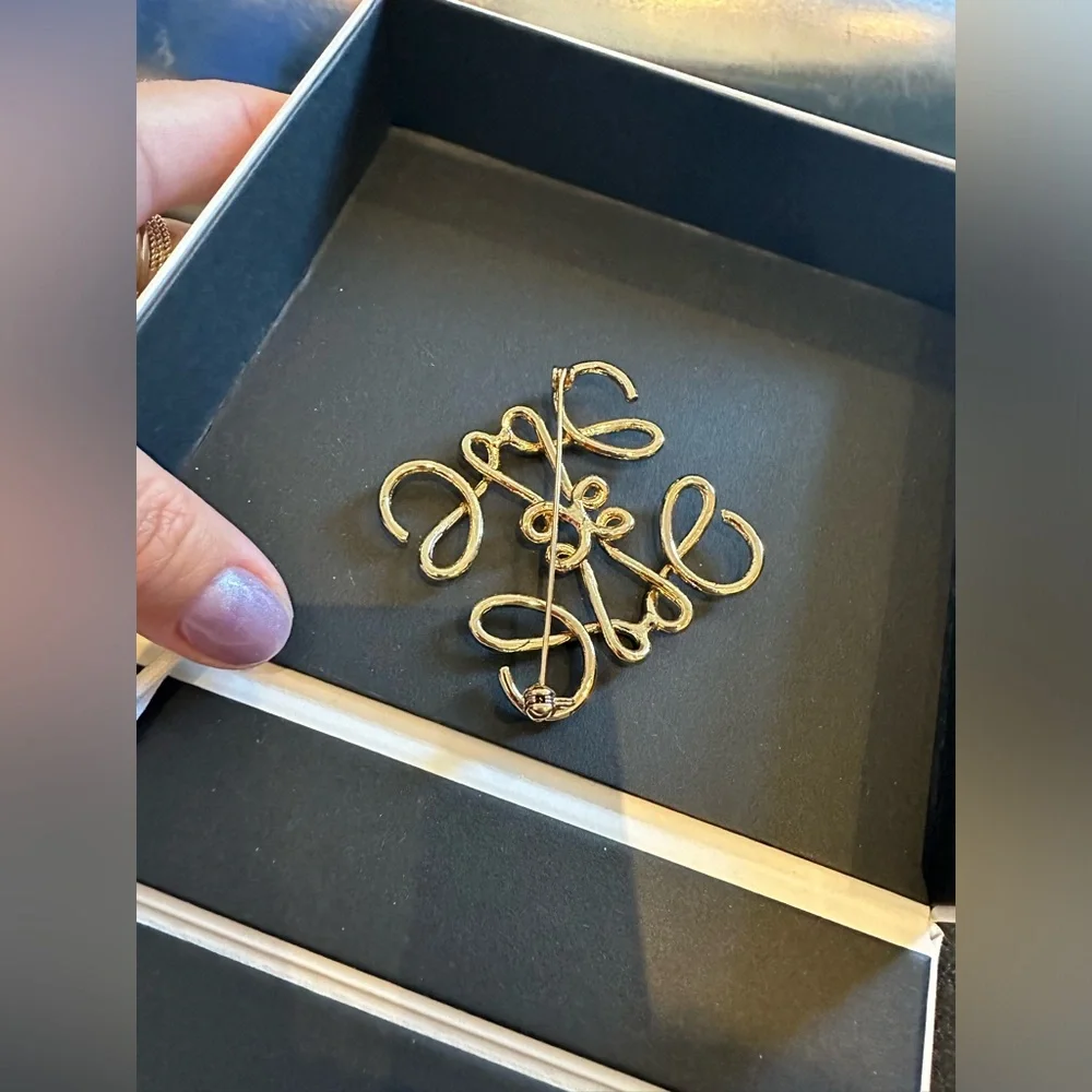 Loewe Gold Signature Anagram pin  Reposhed from a reputable posher . Never worn
